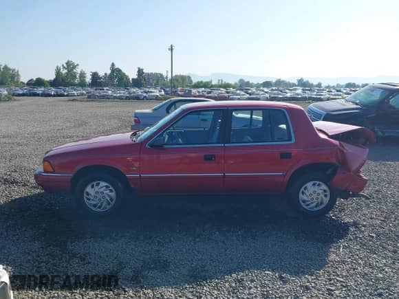 1993 Dodge Spirit with VIN 1B3XA4632PF677192, listed as a IAAI auction lot 42157260 with 100,979 mi miles and . Bid and sale history available at DreamBid. Image 14.
