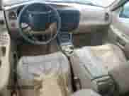 1999 Ford Explorer XLT with VIN 1FMDU34EXXZB35517, listed as a Copart auction lot 64431625 with 111,443 mi miles and Salvage title. Bid and sale history available at DreamBid. Image 8.