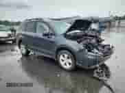 2014 Subaru Forester Touring with VIN JF2SJAPC2EH504023, listed as a Copart auction lot 67115945 with 218,794 mi miles and Salvage title. Bid and sale history available at DreamBid. Image 4.