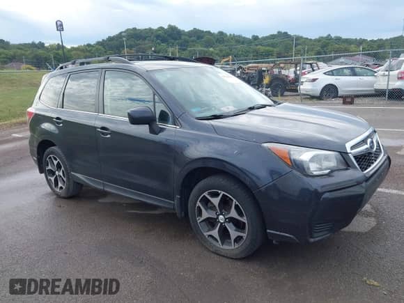 2014 Subaru Forester XT Premium with VIN JF2SJGDC1EH504103, listed as a IAAI auction lot 43126816 with 181,812 mi miles and . Bid and sale history available at DreamBid. Image 13.