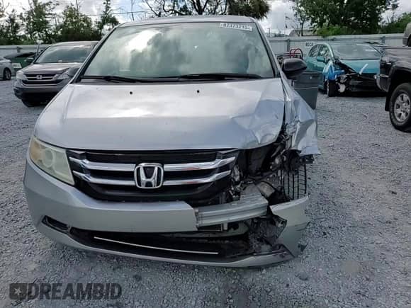2015 Honda Odyssey LX with VIN 5FNRL5H22FB025431, listed as a Copart auction lot 82373215 with 112,487 mi miles and Salvage title. Bid and sale history available at DreamBid. Image 14.