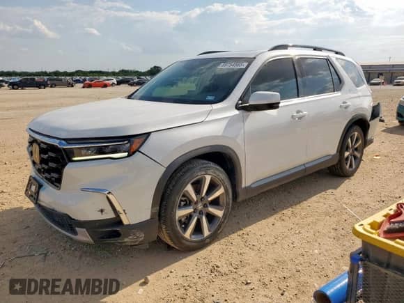 2024 Honda Pilot Touring with VIN 5FNYG1H72RB023817, listed as a Copart auction lot 69754565 with 30,118 mi miles and Salvage title. Bid and sale history available at DreamBid. Image 1.