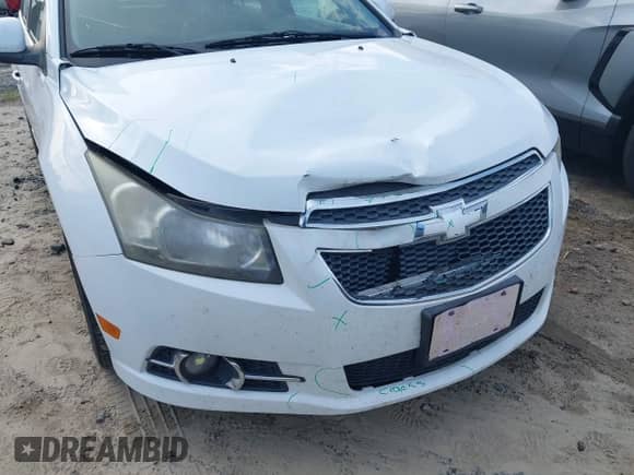 2013 Chevrolet Cruze LTZ z VIN 1G1PG5SB7D7224670, wystawiony jako IAAI lot #42814171 z przebiegiem 189 170 mil mil oraz . Historia ofert i sprzedaży dostępna na DreamBid. Obrazek 6.