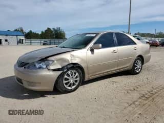 2005 Toyota Camry LE с VIN 4T1BE32K75U103812, выставлен на аукционе Copart как лот 84556275 с пробегом 221 127 миль миль и Списание • Salvage title. История ставок и продаж доступна на DreamBid. Изображение 1.
