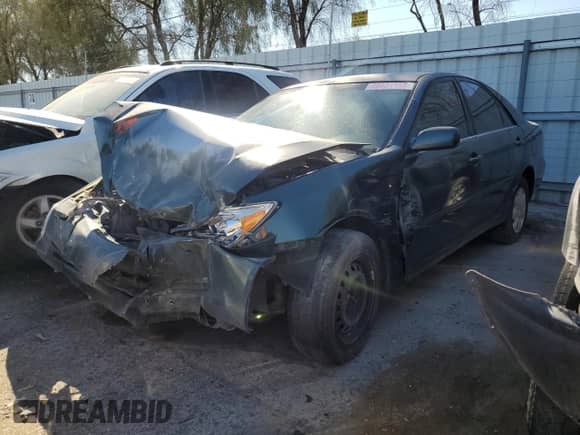 2002 Toyota Camry LE with VIN 4T1BE32K52U579133, listed as a Copart auction lot 70431155 with Not provided miles and Non repairable. Bid and sale history available at DreamBid. Image 1.