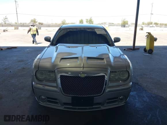 2006 Chrysler 300 C SRT-8 with VIN 2C3LA73W26H471000, listed as a IAAI auction lot 42884335 with 148,180 mi miles and . Bid and sale history available at DreamBid. Image 12.