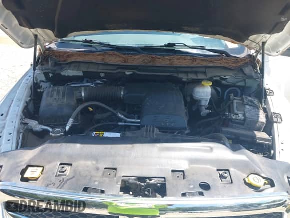 2019 Ram 1500 Tradesman z VIN 3C6RR7KGXKG723179, wystawiony jako IAAI lot #42856742 z przebiegiem Nie podano mil oraz . Historia ofert i sprzedaży dostępna na DreamBid. Obrazek 10.