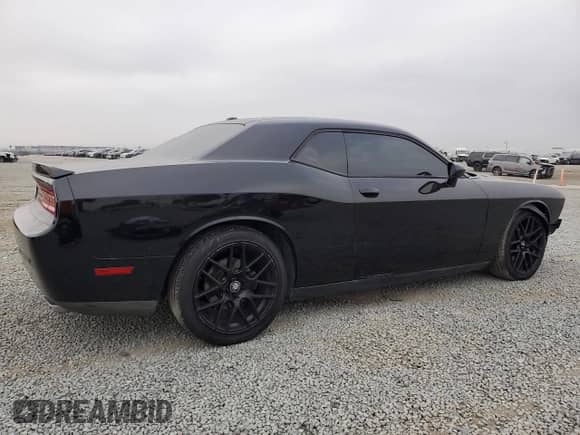 2014 Dodge Challenger R/T с VIN 2C3CDYBT4EH247696, выставлен на аукционе Copart как лот 68892645 с пробегом 102 021 миль миль и Списание • Salvage title. История ставок и продаж доступна на DreamBid. Изображение 3.