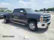 2015 Chevrolet Silverado 3500HD LTZ with VIN 1GC4K0E80FF680420, listed as a Copart auction lot 60500055 with 57,136 mi miles and Salvage title. Bid and sale history available at DreamBid. Image 4.