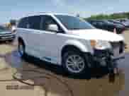 2016 Dodge Grand Caravan SXT with VIN 2C4RDGCG8GR335097, listed as a Copart auction lot 67926545 with 30,818 mi miles and Salvage title. Bid and sale history available at DreamBid. Image 4.