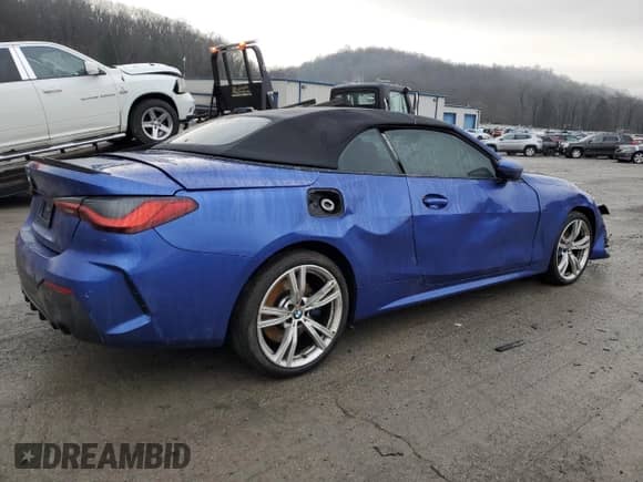 2022 BMW 4 Series 430i xDrive z VIN WBA43AT05NCH99189, wystawiony jako Copart lot #84326424 z przebiegiem Nie podano mil oraz Szkoda całkowita • Salvage title. Historia ofert i sprzedaży dostępna na DreamBid. Obrazek 3.