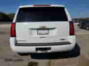 2018 Chevrolet Tahoe LS with VIN 1GNSCAKC0JR264403, listed as a Copart auction lot 82535665 with 136,629 mi miles and Salvage title. Bid and sale history available at DreamBid. Image 6.