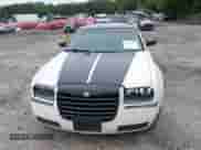 2005 Chrysler 300 300 z VIN 2C3JA43R05H645225, wystawiony jako IAAI lot #42354847 z przebiegiem 234 481 mil mil oraz . Historia ofert i sprzedaży dostępna na DreamBid. Obrazek 12.