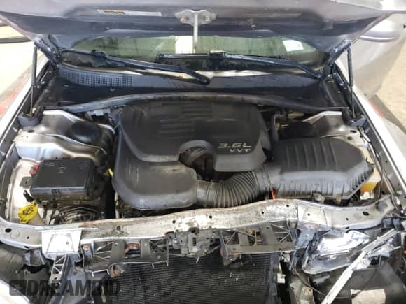 2016 Chrysler 300 Anniversary Edition с VIN 2C3CCARG4GH182547, выставлен на аукционе Copart как лот 48281965 с пробегом 115 611 миль миль и Списание • Salvage title. История ставок и продаж доступна на DreamBid. Изображение 11.