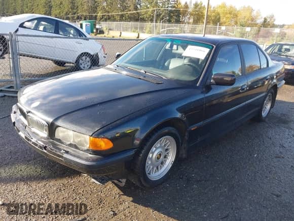 1999 BMW 7 Series with VIN WBAGG8333XDN73344, listed as a IAAI auction lot 43541066 with 48,415 mi miles and . Bid and sale history available at DreamBid. Image 2.