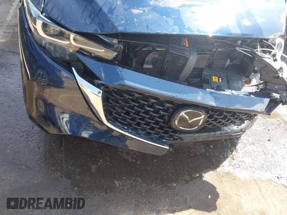 2022 Mazda CX-5 S Select z VIN JM3KFBBM8N0625778, wystawiony jako IAAI lot #42547233 z przebiegiem 34 889 mil mil oraz . Historia ofert i sprzedaży dostępna na DreamBid. Obrazek 17.