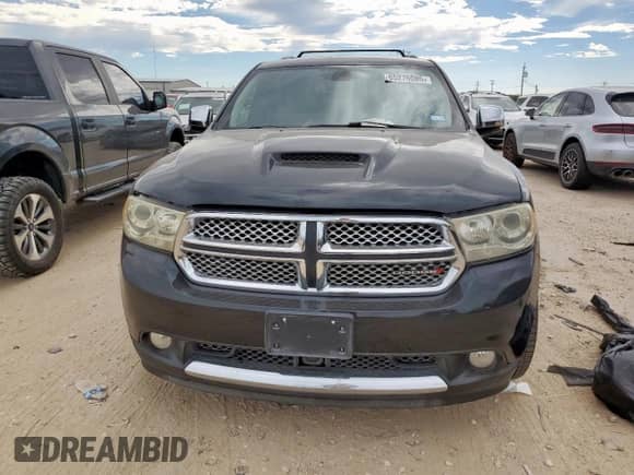 2013 Dodge Durango Citadel с VIN 1C4SDHET0DC637537, выставлен на аукционе Copart как лот 65275085 с пробегом 172 543 миль миль и Списание • Salvage title. История ставок и продаж доступна на DreamBid. Изображение 5.