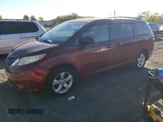 2012 Toyota Sienna LE AAS with VIN 5TDKK3DC3CS183260, listed as a Copart auction lot 86156185 with 198,885 mi miles and Clean title. Bid and sale history available at DreamBid. Image 1.