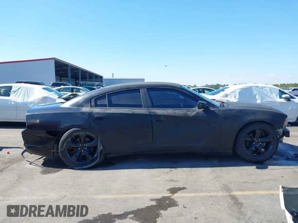 2013 Dodge Charger SE с VIN 2C3CDXBG9DH664064, выставлен на аукционе IAAI как лот 43424369 с пробегом 186 219 миль миль и . История ставок и продаж доступна на DreamBid. Изображение 14.