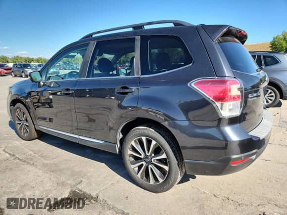 2017 Subaru Forester Touring z VIN JF2SJGWC1HH551911, wystawiony jako Copart lot #84236215 z przebiegiem 59 041 mil mil oraz Czysty tytuł • Clean title. Historia ofert i sprzedaży dostępna na DreamBid. Obrazek 2.