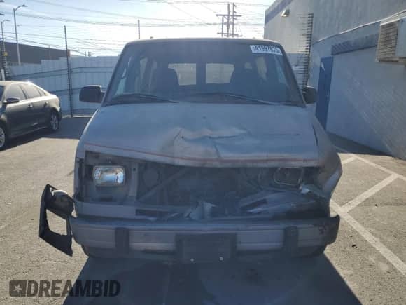 1992 Chevrolet Astro с VIN 1GNDM19Z3NB219051, выставлен на аукционе Copart как лот 41997675 с пробегом 242 745 миль миль и Списание • Salvage title. История ставок и продаж доступна на DreamBid. Изображение 5.