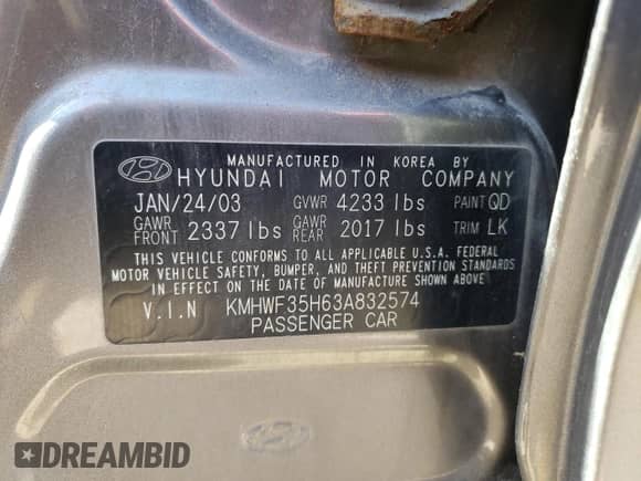 2003 Hyundai Sonata GLS z VIN KMHWF35H63A832574, wystawiony jako Copart lot #52094854 z przebiegiem 163 848 mil mil oraz Nie do naprawy • Non repairable. Historia ofert i sprzedaży dostępna na DreamBid. Obrazek 12.