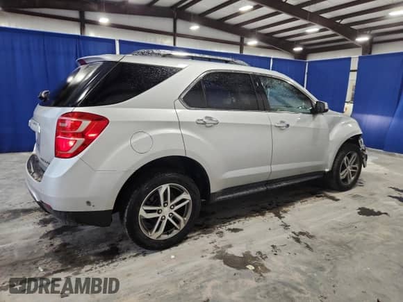 2016 Chevrolet Equinox LTZ z VIN 2GNALDEK8G1162090, wystawiony jako Copart lot #69849685 z przebiegiem 67 276 mil mil oraz Szkoda całkowita • Salvage title. Historia ofert i sprzedaży dostępna na DreamBid. Obrazek 3.