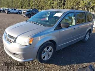 2013 Dodge Grand Caravan SE with VIN 2C4RDGBG6DR703399, listed as a IAAI auction lot 43230305 with 113,048 mi miles and . Bid and sale history available at DreamBid. Image 2.