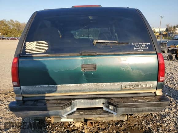 1995 Chevrolet Tahoe with VIN 3GNEK18K7SG119164, listed as a Copart auction lot 77744684 with 165,798 mi miles and Salvage title. Bid and sale history available at DreamBid. Image 6.