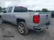 2017 Chevrolet Silverado 1500 LT with VIN 1GCVKREC5HZ328321, listed as a IAAI auction lot 42818538 with 137,263 mi miles and . Bid and sale history available at DreamBid. Image 3.