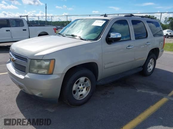 2007 Chevrolet Tahoe LT with VIN 1GNFK13077R418025, listed as a IAAI auction lot 42997636 with 301,389 mi miles and . Bid and sale history available at DreamBid. Image 2.