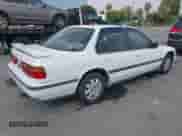 1990 Honda Accord LX with VIN JHMCB7652LC067333, listed as a IAAI auction lot 42580921 with 119,733 mi miles and . Bid and sale history available at DreamBid. Image 4.