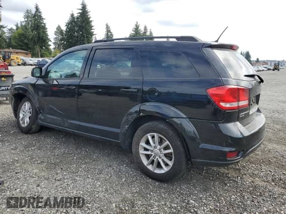 2015 Dodge Journey SXT with VIN 3C4PDDBG4FT651602, listed as a Copart auction lot 80058895 with 117,993 mi miles and Salvage title. Bid and sale history available at DreamBid. Image 2.