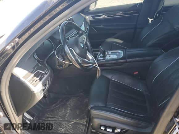 2019 BMW 7 Series 750i xDrive z VIN WBA7F2C54KB239989, wystawiony jako Copart lot #76759694 z przebiegiem 72 867 mil mil oraz Szkoda całkowita • Salvage title. Historia ofert i sprzedaży dostępna na DreamBid. Obrazek 7.