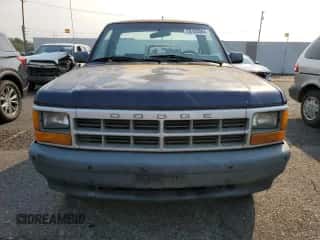 1994 Dodge Dakota z VIN 1B7FL26XXRS606540, wystawiony jako Copart lot #70103064 z przebiegiem 123 850 mil mil oraz Czysty tytuł • Clean title. Historia ofert i sprzedaży dostępna na DreamBid. Obrazek 5.