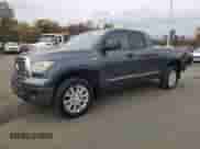 2012 Toyota Tundra z VIN 5TFUY5F18CX216522, wystawiony jako Copart lot #87483585 z przebiegiem 157 956 mil mil oraz Czysty tytuł • Clean title. Historia ofert i sprzedaży dostępna na DreamBid. Obrazek 1.