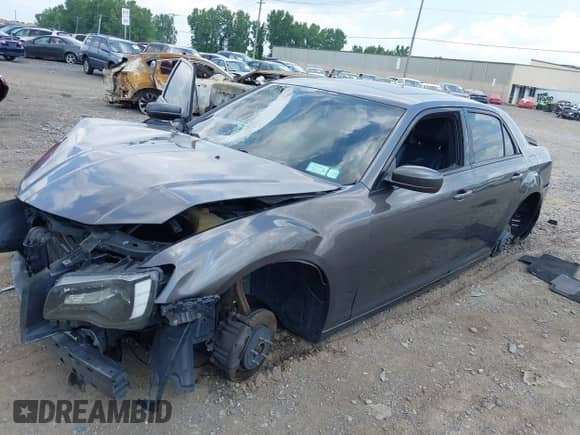 2014 Chrysler 300 S with VIN 2C3CCAGG0EH357179, listed as a IAAI auction lot 42706209 with 121,612 mi miles and . Bid and sale history available at DreamBid. Image 2.