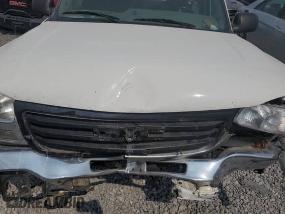 2004 GMC Sierra 1500 SLE z VIN 2GTEC19T041140477, wystawiony jako Copart lot #70844745 z przebiegiem Nie podano mil oraz Szkoda całkowita • Salvage title. Historia ofert i sprzedaży dostępna na DreamBid. Obrazek 11.
