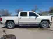 2014 Chevrolet Silverado 1500 LTZ z VIN 3GCUKSEJ0EG439324, wystawiony jako IAAI lot #42148611 z przebiegiem 176 409 mil mil oraz . Historia ofert i sprzedaży dostępna na DreamBid. Obrazek 13.
