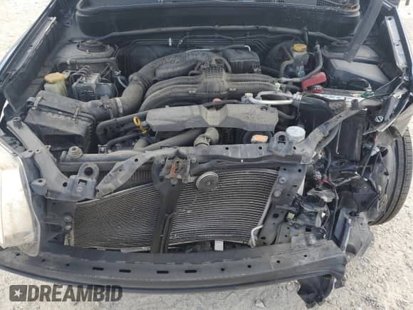 2013 Subaru Forester X z VIN JF2SHABC1DH446326, wystawiony jako Copart lot #81968715 z przebiegiem 121 814 mil mil oraz Szkoda całkowita • Salvage title. Historia ofert i sprzedaży dostępna na DreamBid. Obrazek 12.