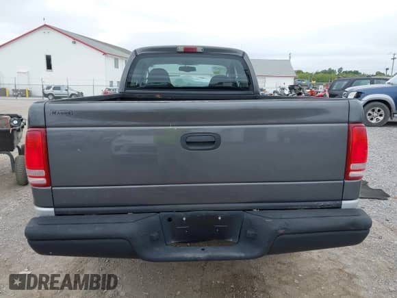 2003 Dodge Dakota SLT z VIN 1D7HG42N43S297223, wystawiony jako IAAI lot #43267825 z przebiegiem 159 794 mil mil oraz . Historia ofert i sprzedaży dostępna na DreamBid. Obrazek 16.