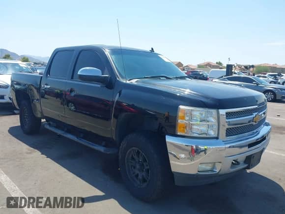 2013 Chevrolet Silverado 1500 LT with VIN 3GCPKSE72DG312123, listed as a IAAI auction lot 43064081 with 150,661 mi miles and . Bid and sale history available at DreamBid. Image 1.