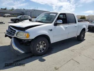 2002 Ford F-150 XLT с VIN 1FTRW07612KC06709, выставлен на аукционе Copart как лот 61016915 с пробегом Не указан миль и Списание • Salvage title. История ставок и продаж доступна на DreamBid. Изображение 1.
