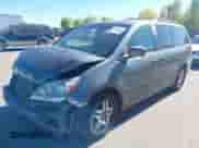 2007 Honda Odyssey EX-L z VIN 5FNRL38677B461040, wystawiony jako IAAI lot #43478771 z przebiegiem 201 942 mil mil oraz . Historia ofert i sprzedaży dostępna na DreamBid. Obrazek 2.