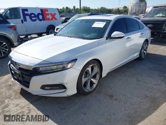 2018 Honda Accord Touring с VIN 1HGCV1F94JA107639, выставлен на аукционе IAAI как лот 42482273 с пробегом 92 594 миль миль и . История ставок и продаж доступна на DreamBid. Изображение 17.