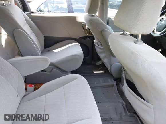2019 Toyota Sienna LE with VIN 5TDJZ3DC2KS214116, listed as a IAAI auction lot 42451420 with 77,201 mi miles and . Bid and sale history available at DreamBid. Image 8.