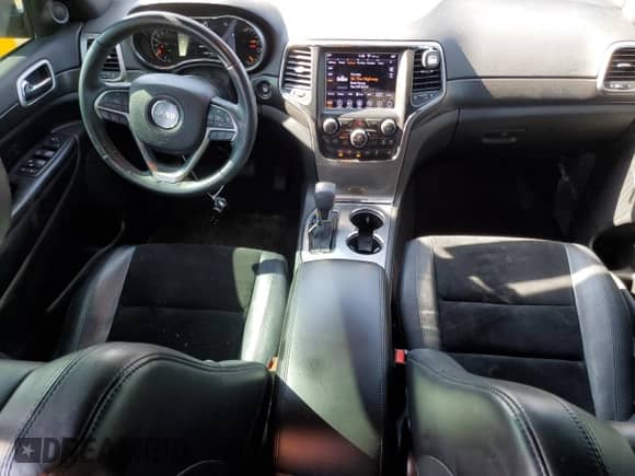 2018 Jeep Grand Cherokee Laredo with VIN 1C4RJFAG4JC140393, listed as a Copart auction lot 86468525 with 110,514 mi miles and Salvage title. Bid and sale history available at DreamBid. Image 8.