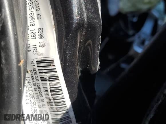 2014 Dodge Durango Limited with VIN 1C4RDJDG9EC551963, listed as a Copart auction lot 62237635 with 185,073 mi miles and Salvage title. Bid and sale history available at DreamBid. Image 14.