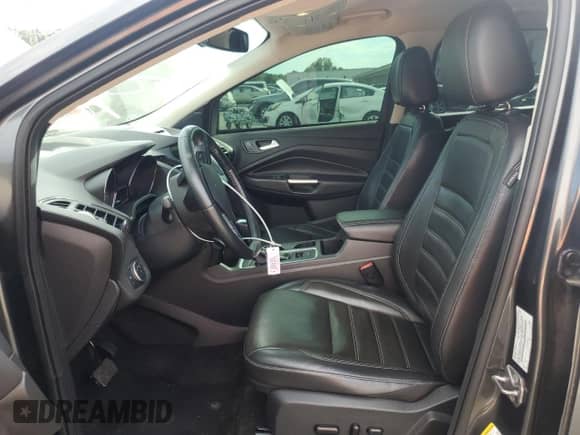 2017 Ford Escape Titanium с VIN 1FMCU0JD6HUD17364, выставлен на аукционе Copart как лот 68642355 с пробегом 87 671 миль миль и Списание • Salvage title. История ставок и продаж доступна на DreamBid. Изображение 7.
