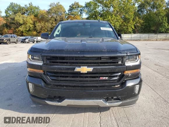 2019 Chevrolet Silverado 1500 LT with VIN 2GCVKPEC6K1240687, listed as a Copart auction lot 80646435 with 76,157 mi miles and Salvage title. Bid and sale history available at DreamBid. Image 5.